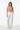 Bikini top with white linen pants beach club