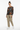 Female model in khaki cargo pants and white sneakers