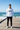 Male 4 — black joggers, beach boardwalk