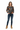 Female model in dark denim jeans and tan hiking boots