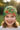 Girl age 5 wearing dinosaur jungle beanie