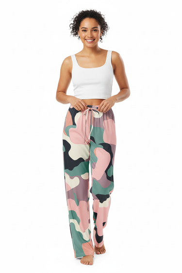 Woman adjusting camo-print pajama pants