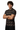 Muscular model with arms crossed