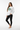 White female model three-quarter view with leggings